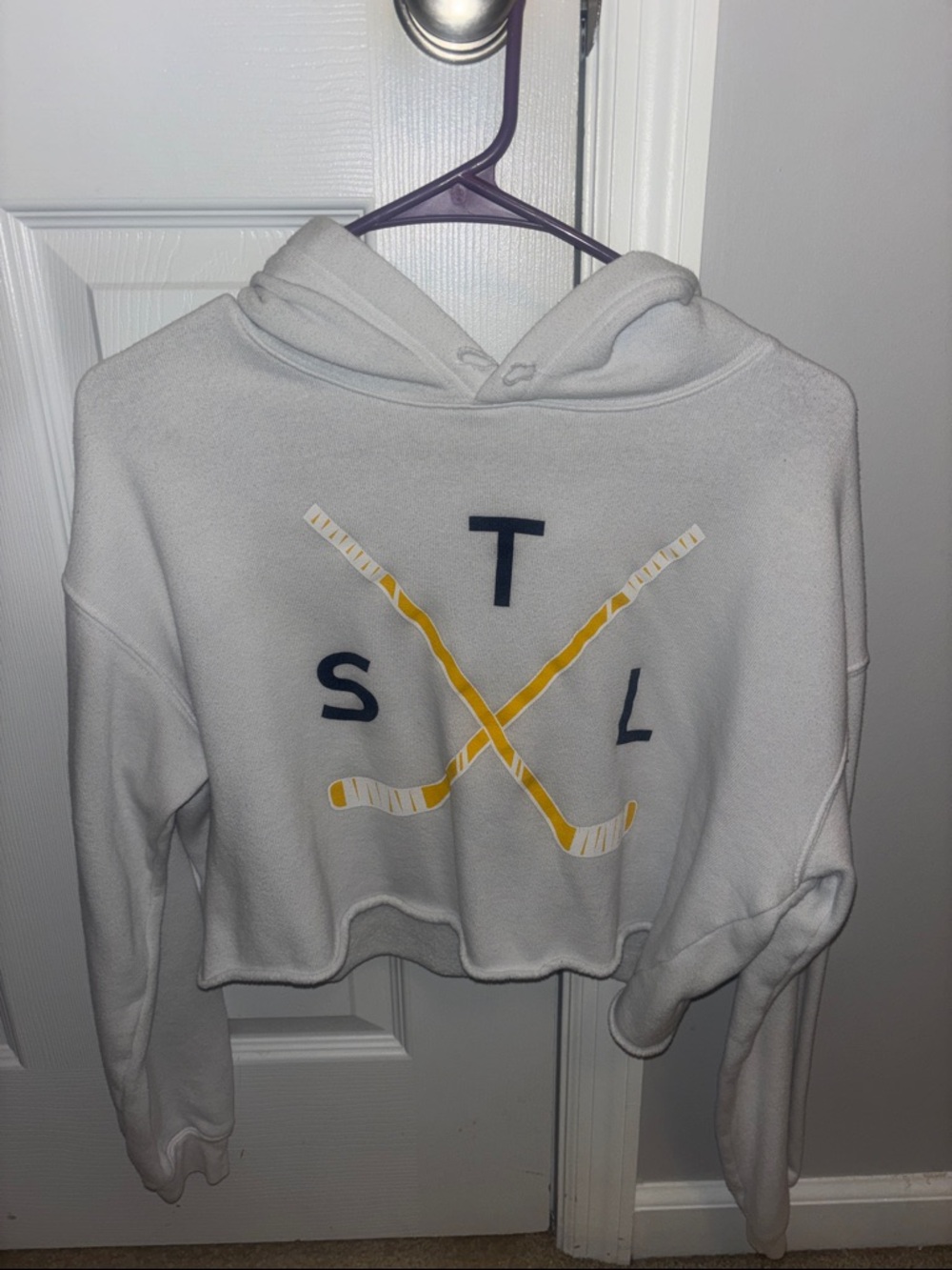 Cropped White Hoodie with Yellow Hockey Stick Graphic